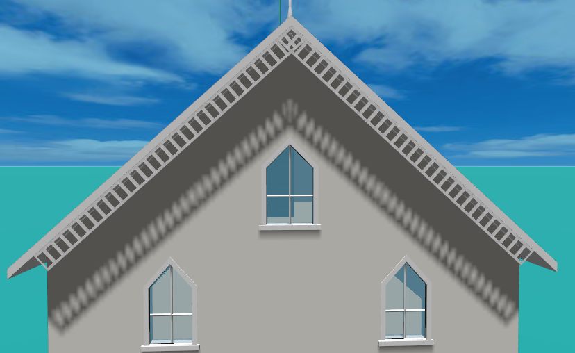 A gable end with a spindle bargeboard: a close-set run of turned spindles between two rails